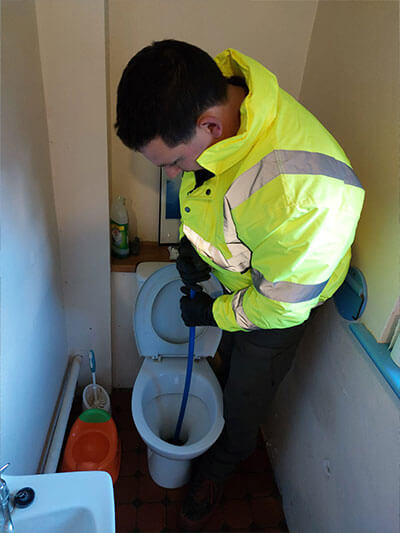 Toilet unblocking on Esher High Street