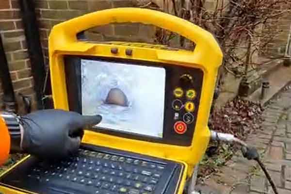 Drain Cleaning and descaling in Esher Drain Cleaning and descaling shown on CCTV in Esher