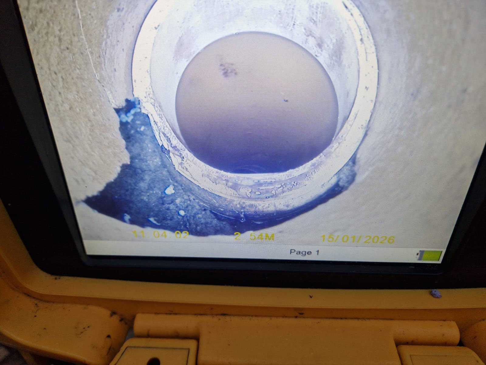 Before drain repair using GRP patch liner in Guildford Before CCTV image showing a broken drain repaired using a GRP patch liner in Guildford Surrey
